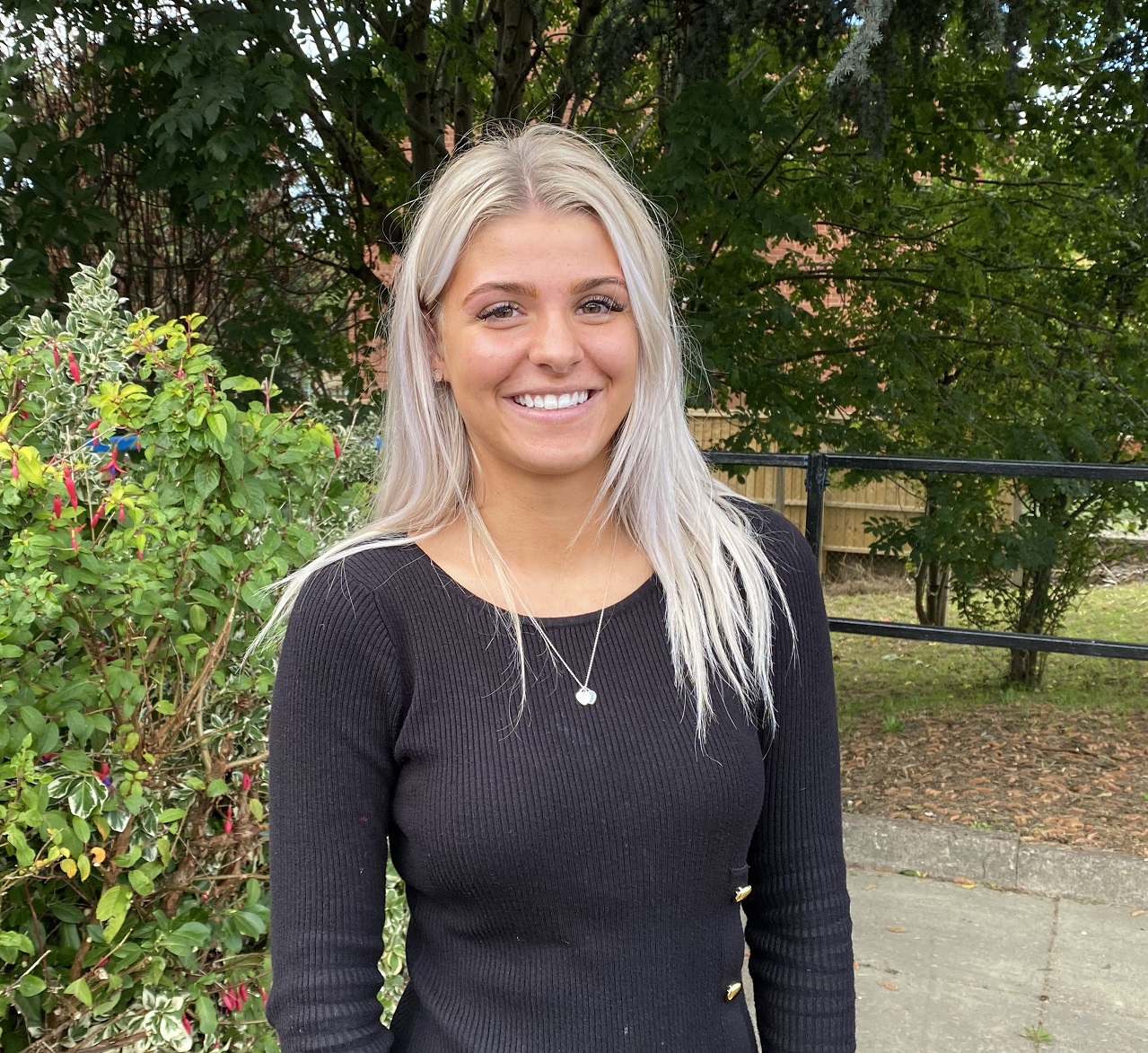 Emily Marriot stood outside NLT Training Services