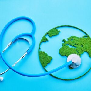 Blue graphic with the world illustrated as a globe in felt with a stethoscope laid at the side with the chest piece placed on the globe