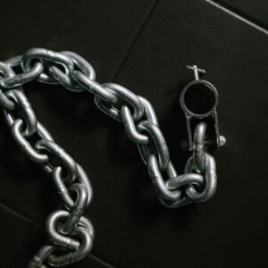 Chain rope laid on a black background